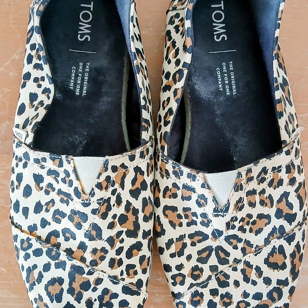 TOMS Leopard Print Slip-On Flats in Tan and Black